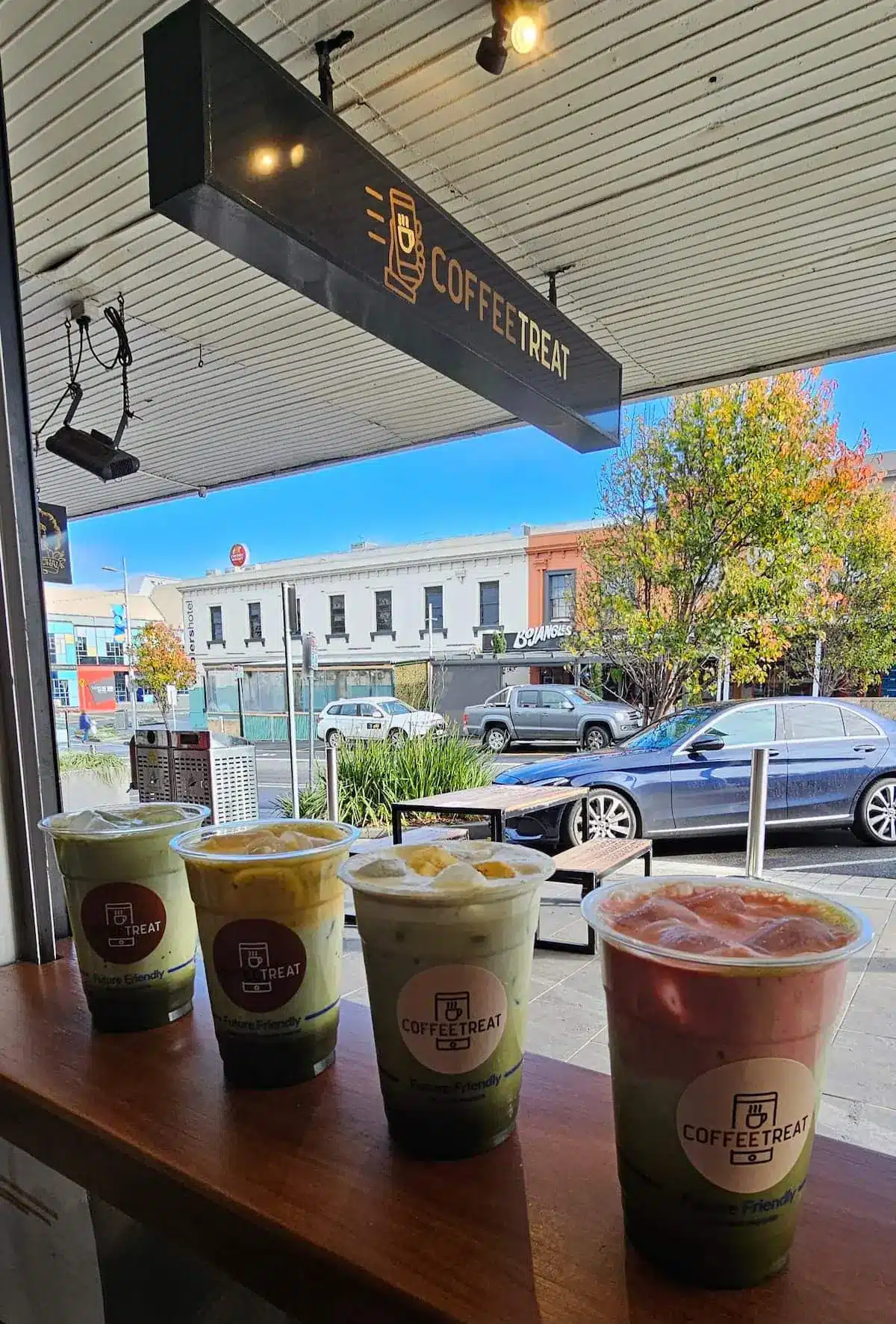 Coffee Treat Warrnambool storefront on Liebig Street, with iced drinks lined up on the window bench and the street outside